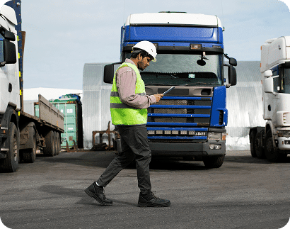 young-elegant-foreman-his-subordinate-workwear-discussing-technical-sketch-touchpad-meeting-factory-workshop